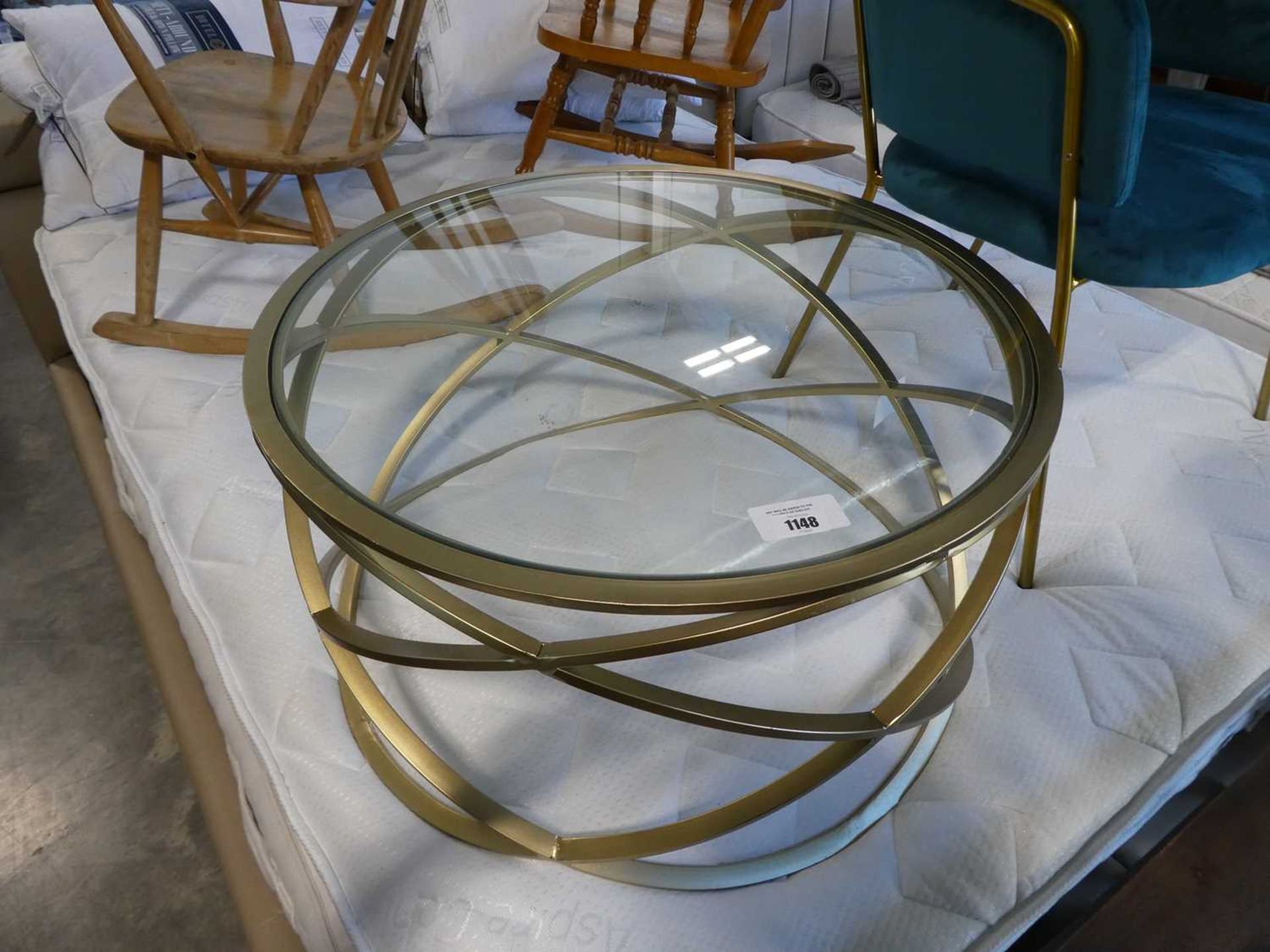 +VAT Circular metal framed coffee table with glass surface