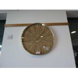 +VAT Brass coloured wall clock with pine effect backboard