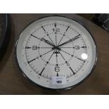 +VAT Black metal framed wall clock in form of airplane dial