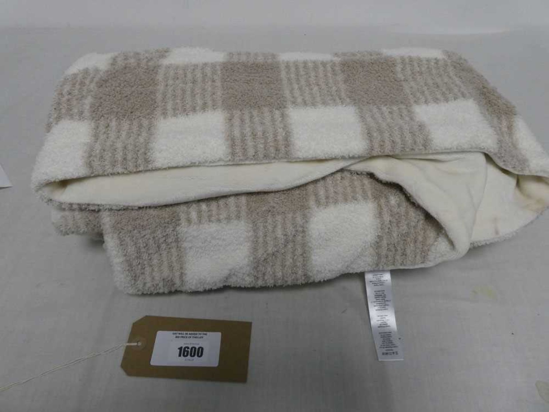 +VAT Brown and white patterned throw