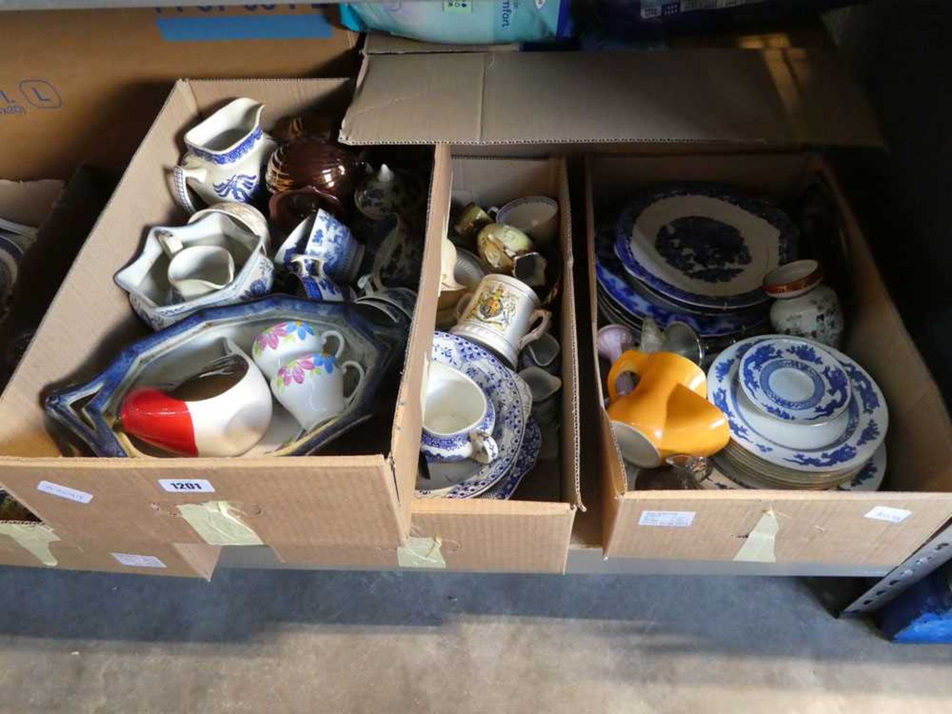 Under bay containing 7 boxes of mixed china