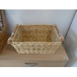 Wicker basket with wooden handles