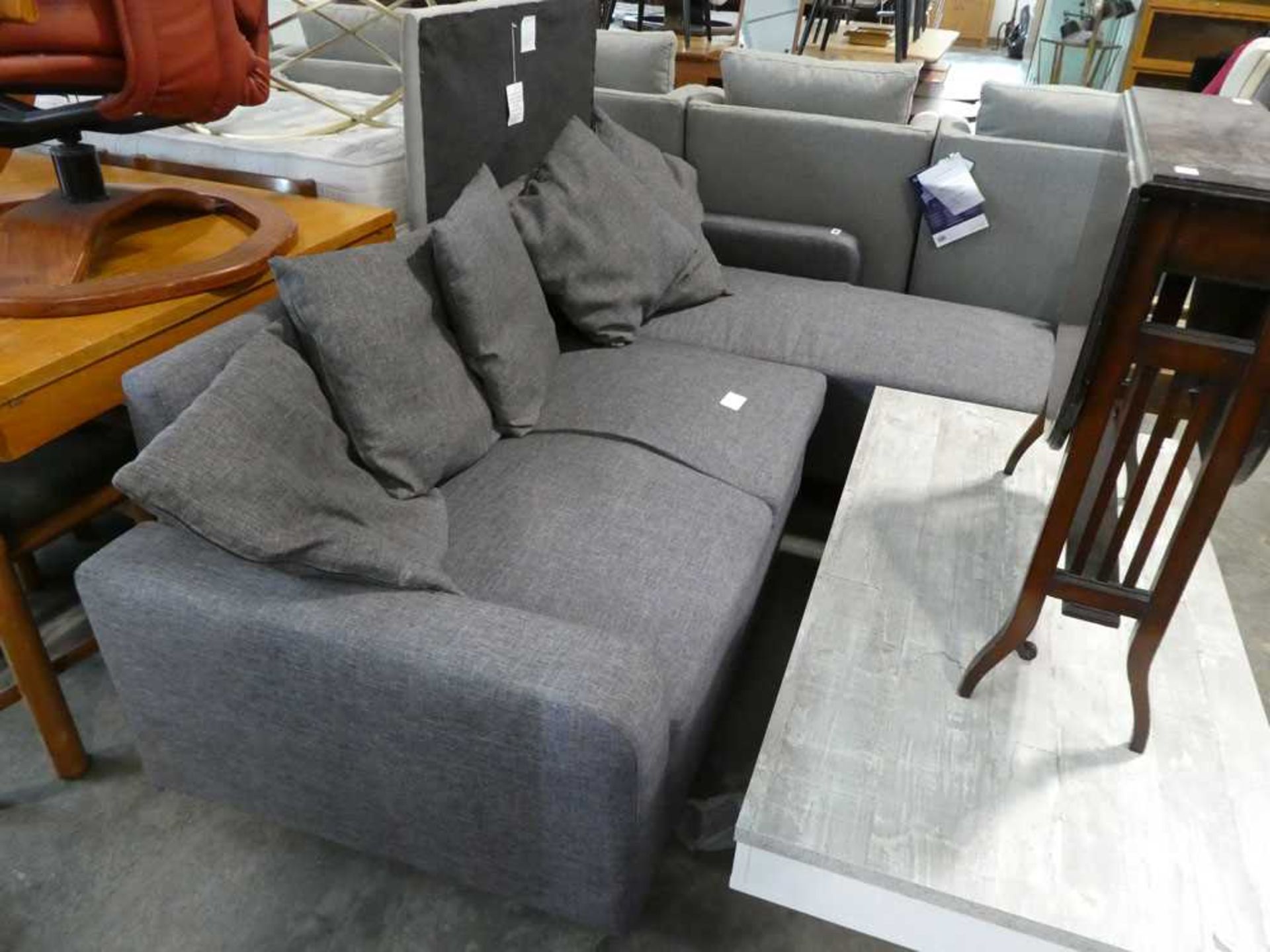 Dark grey upholstered modern L-shaped sofa