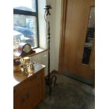 Twin branch brass standard floor lamp on 3 curved claw shaped supports