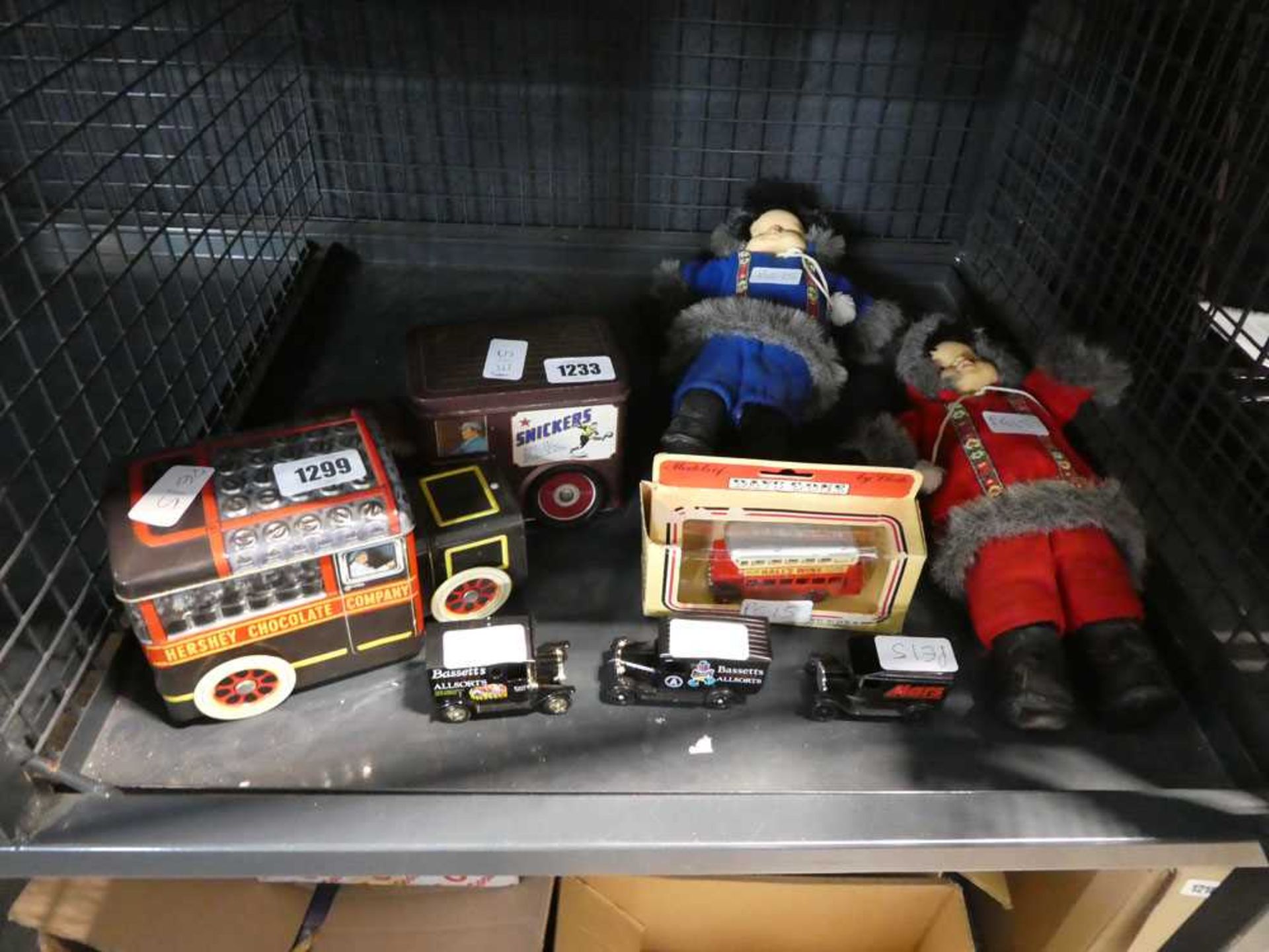 2 dolls and various diecast incl. Liquorice Allsorts vans, Hershey's chocolate tin, etc.