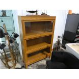 Honey oak Barnster modular bookcase by Hale Furniture, in the style of a globe wernicke bookcase