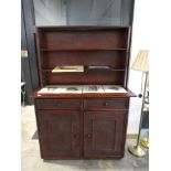 Stained wood and cane cupboard with 2 drawers and bookcase over