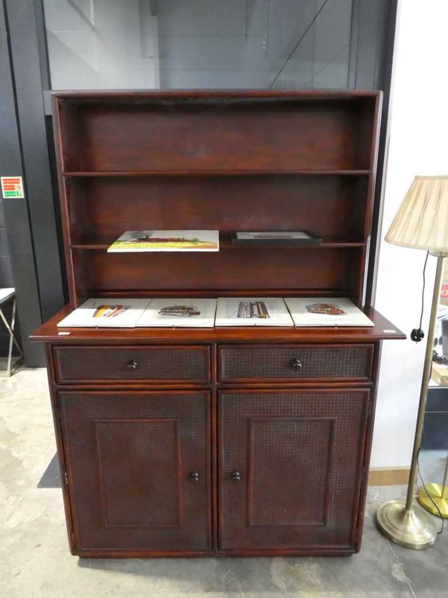 Stained wood and cane cupboard with 2 drawers and bookcase over