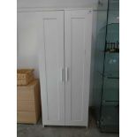 Modern white wardrobe Noticeable scratch to door