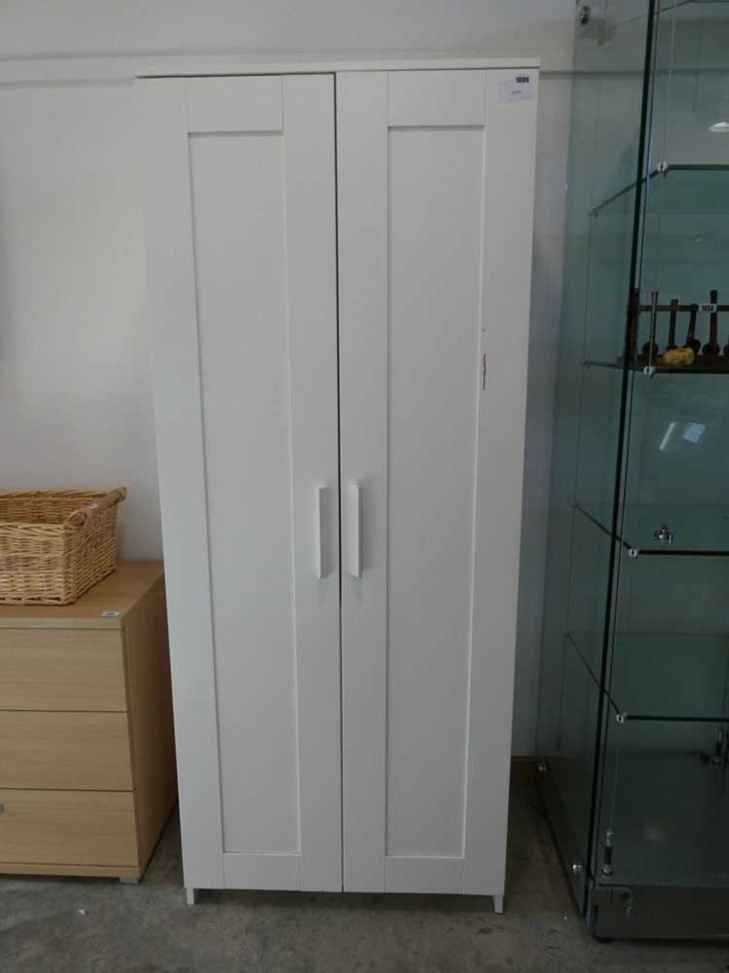 Modern white wardrobe Noticeable scratch to door