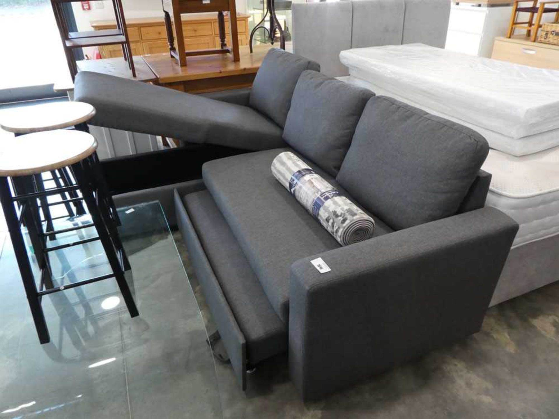 +VAT Grey upholstered L-shaped corner sofa with storage, seating and pull out footstool