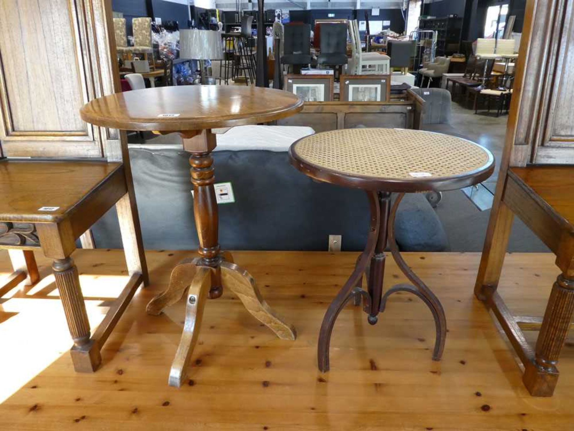 2 circular single pedestal side tables (1 with cane surface)
