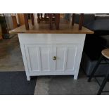 White painted early 20th Century double sided kitchen island with bare pine surface