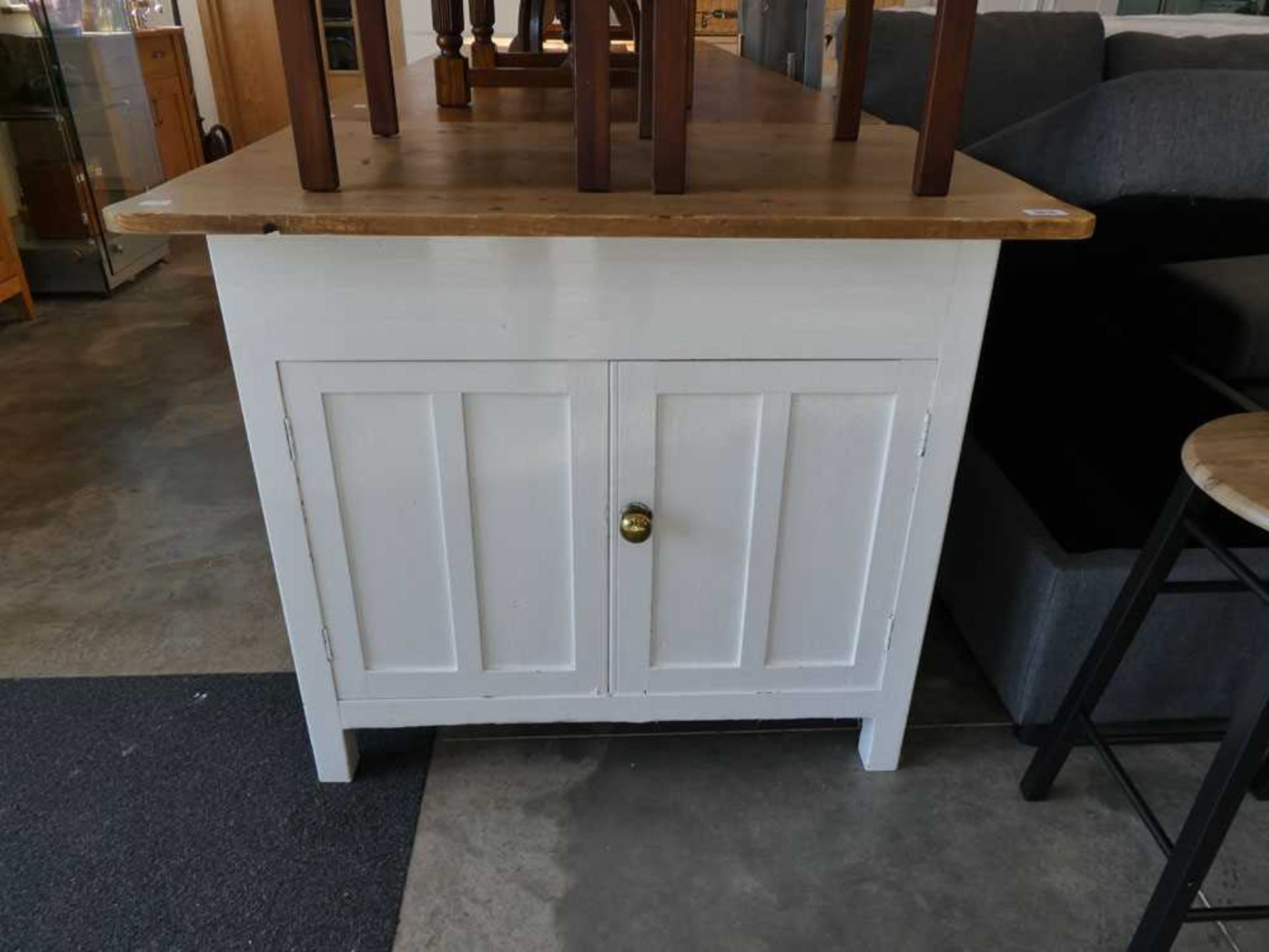 White painted early 20th Century double sided kitchen island with bare pine surface