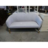 Modern 2 seater light grey upholstered sofa on wooden frame