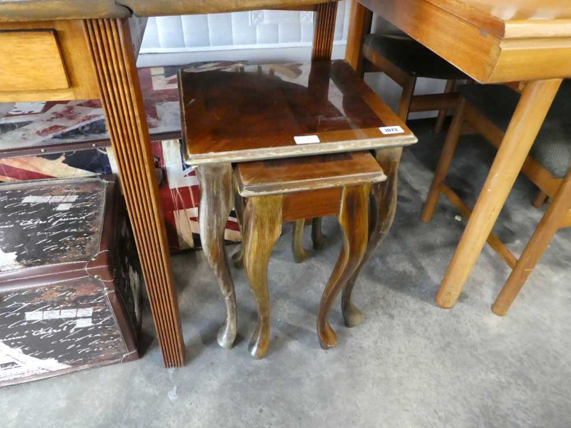 Small nest of walnut effect coffee tables