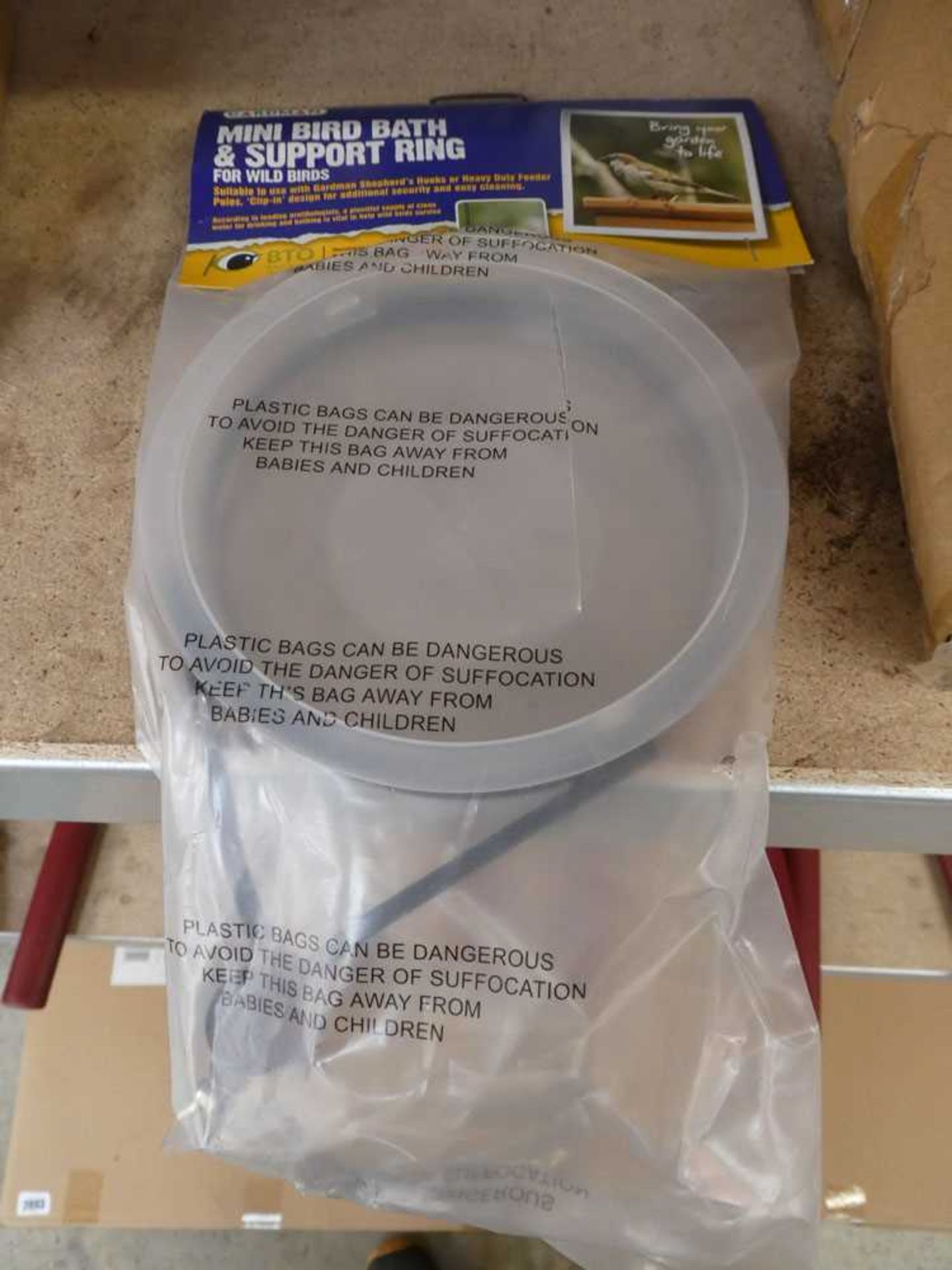 2 boxes containing 12 mini bird bath ring supports