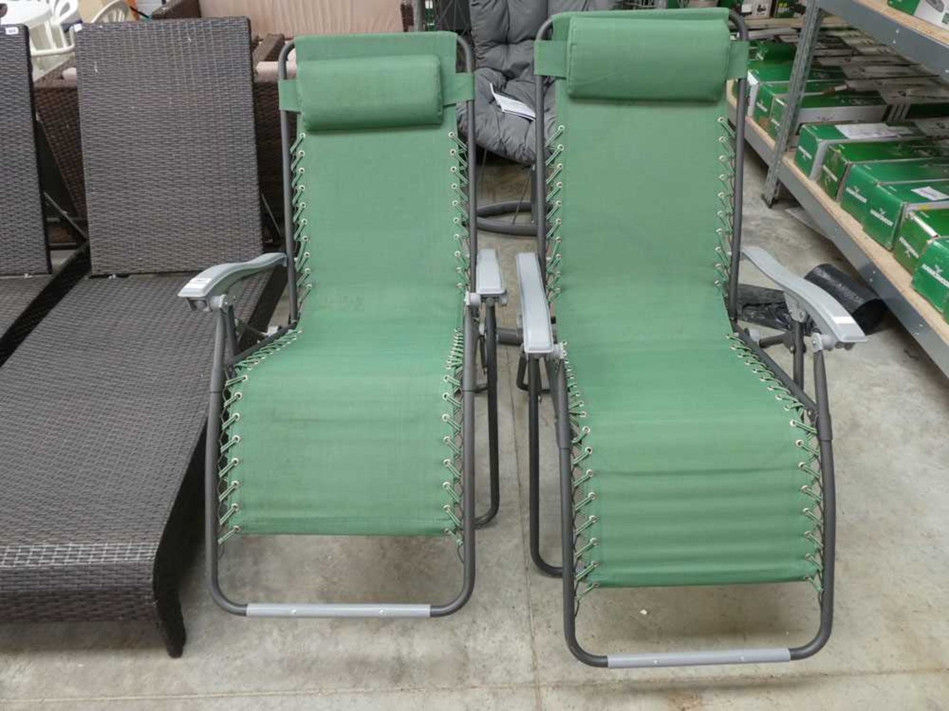 Pair of green and grey reclining sun loungers