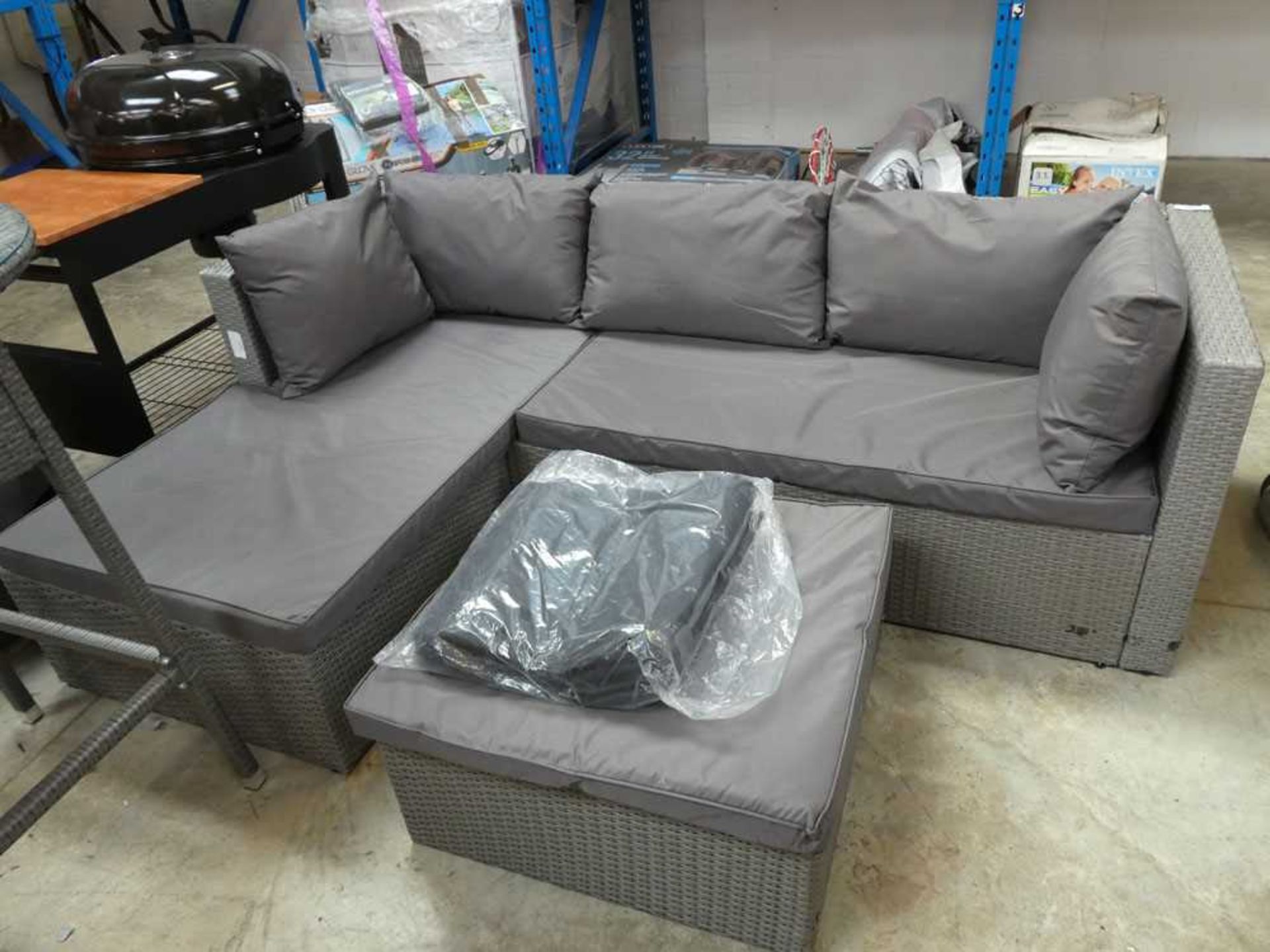 +VAT Light grey rattan L-shaped sofa with footstool and matching dark grey cushions