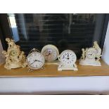 Collection of 5 various mantle clocks in white or off-white incl. ornamental cherub clock, Juliana