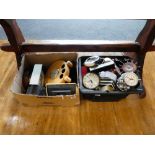 2 crates containing various alarm clocks, small mantle clocks, clock keys, etc.