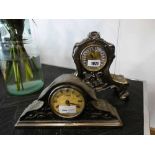 2 ornate mantle clocks; faux metal cased with quartz movements