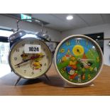 Chinese Tweety Pie alarm clock and metal cased Smiths of Enfield Noddy alarm clock