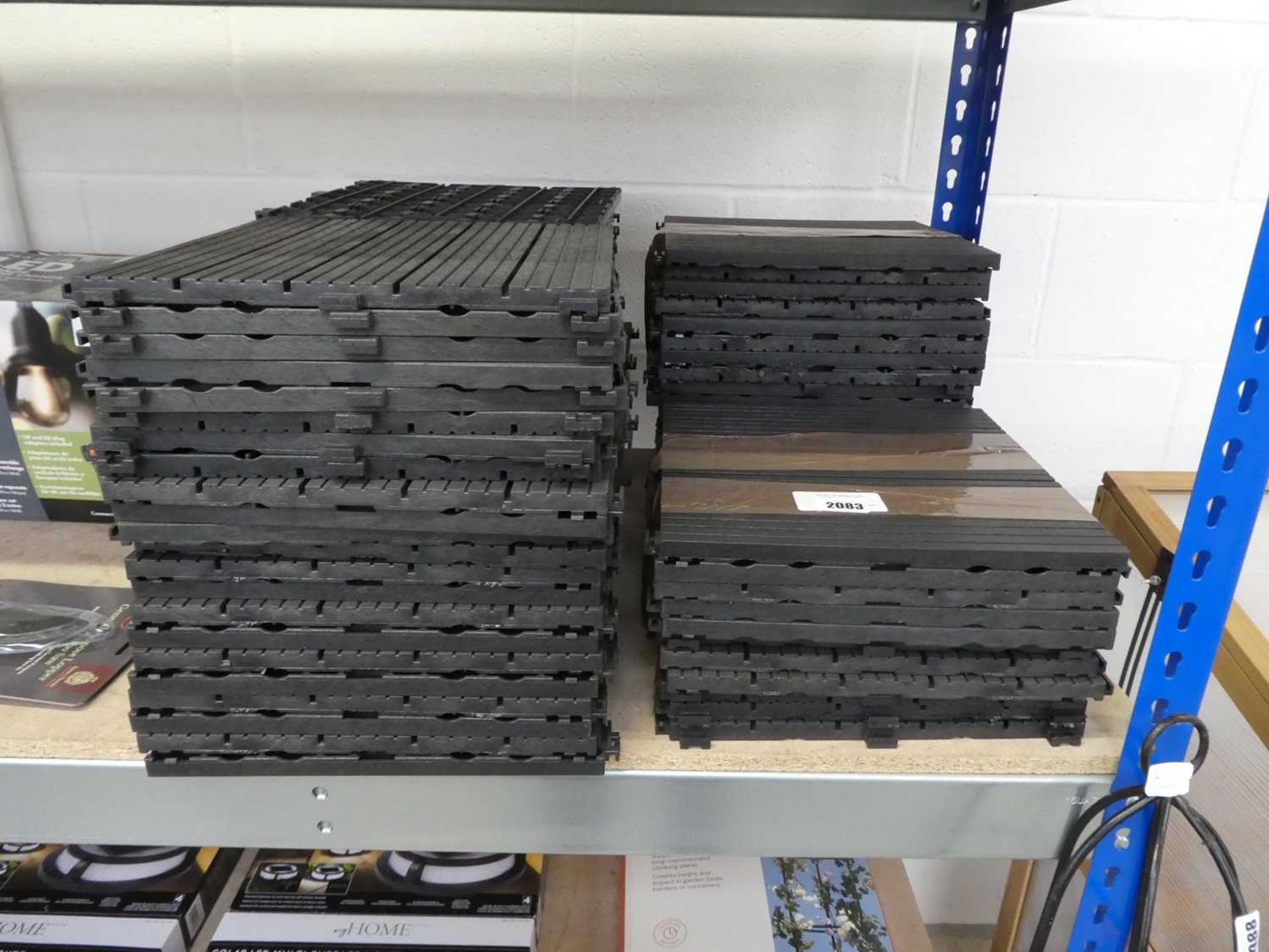 +VAT Large quantity of Keter black plastic decking tiles