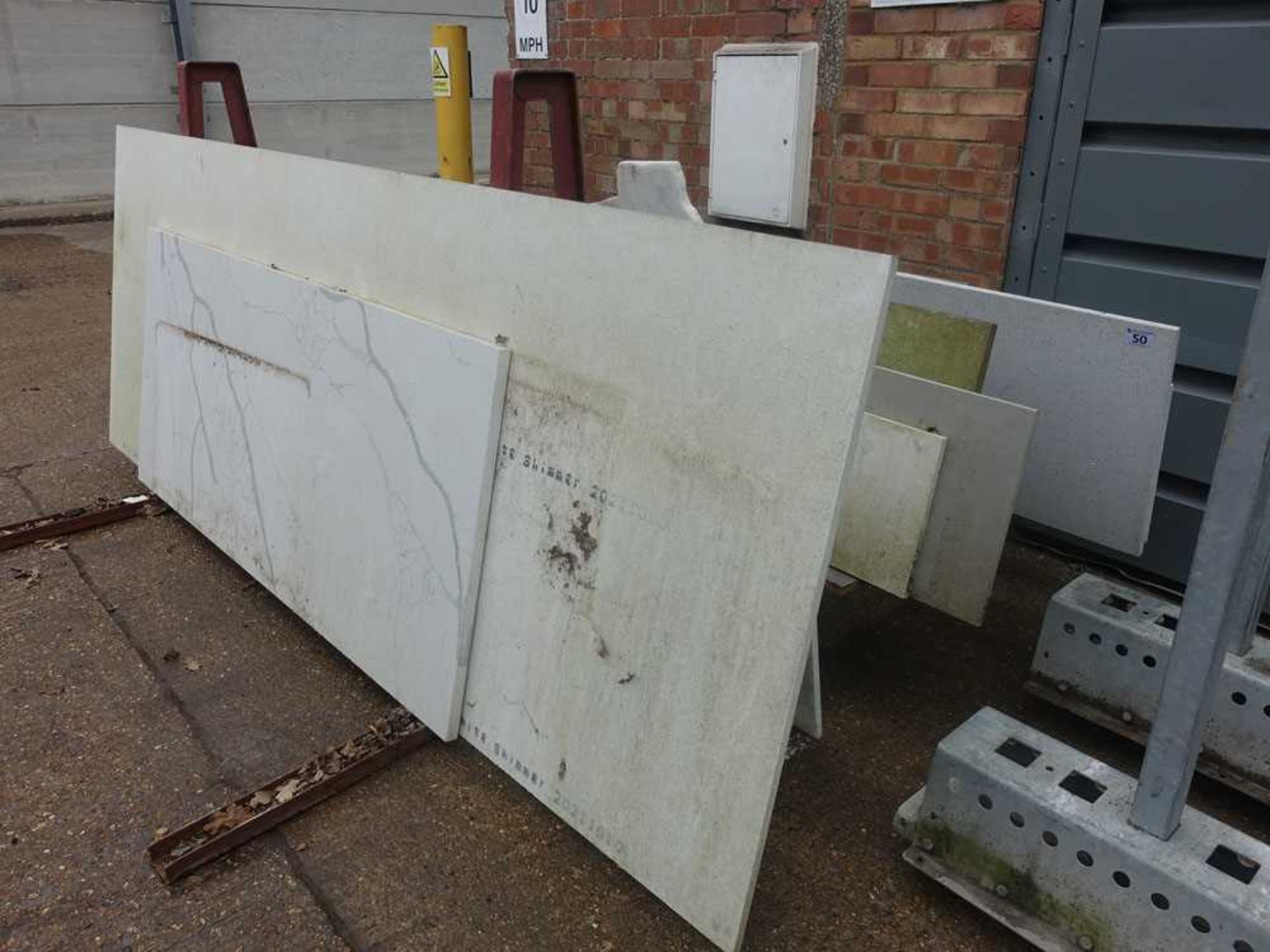 +VAT Remaining stock of marble, quartz, and other sheeting (outside the building)