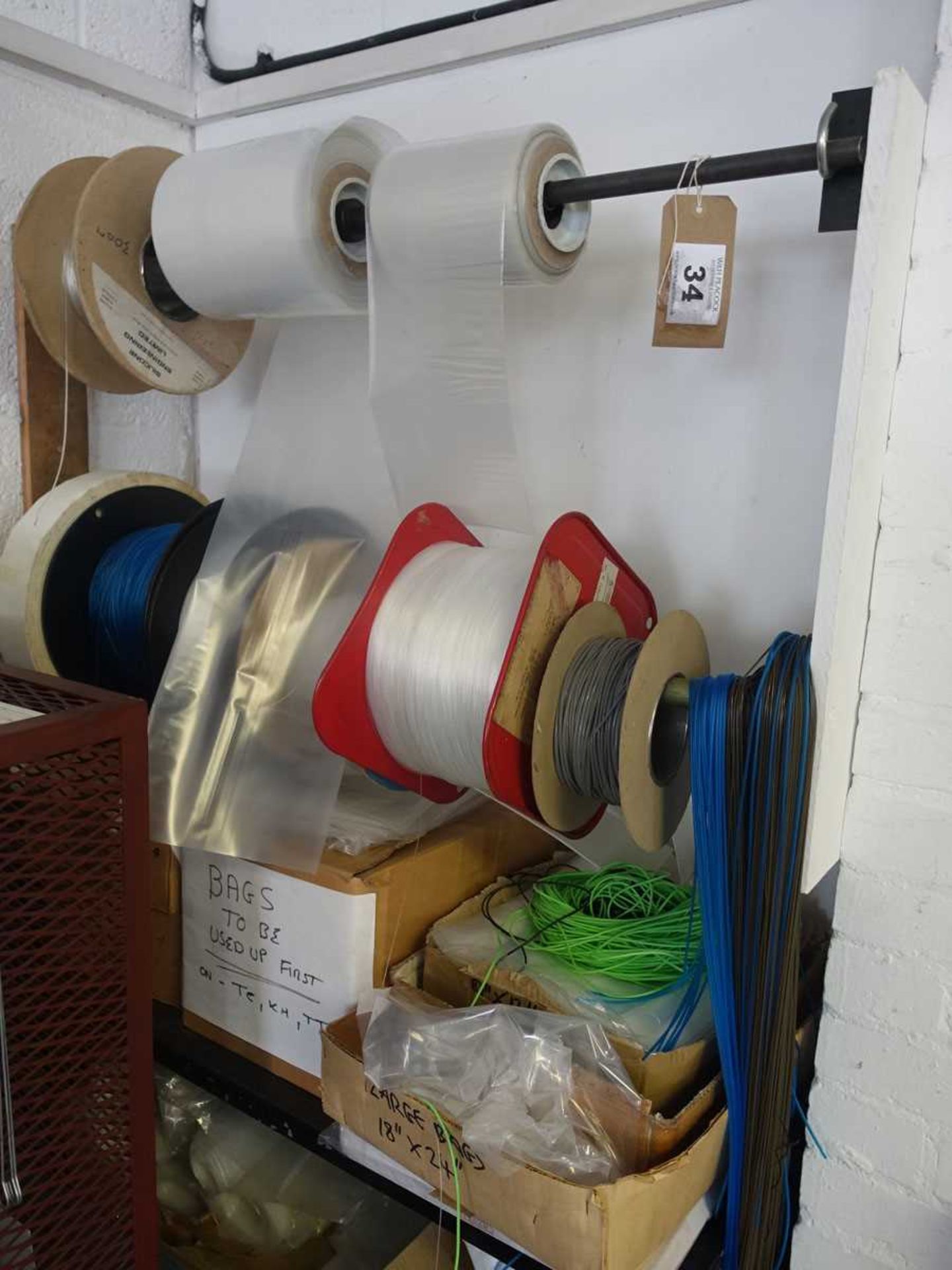 +VAT Quantity of bags, packaging, string and tubing with rack & decoiler - Image 2 of 2