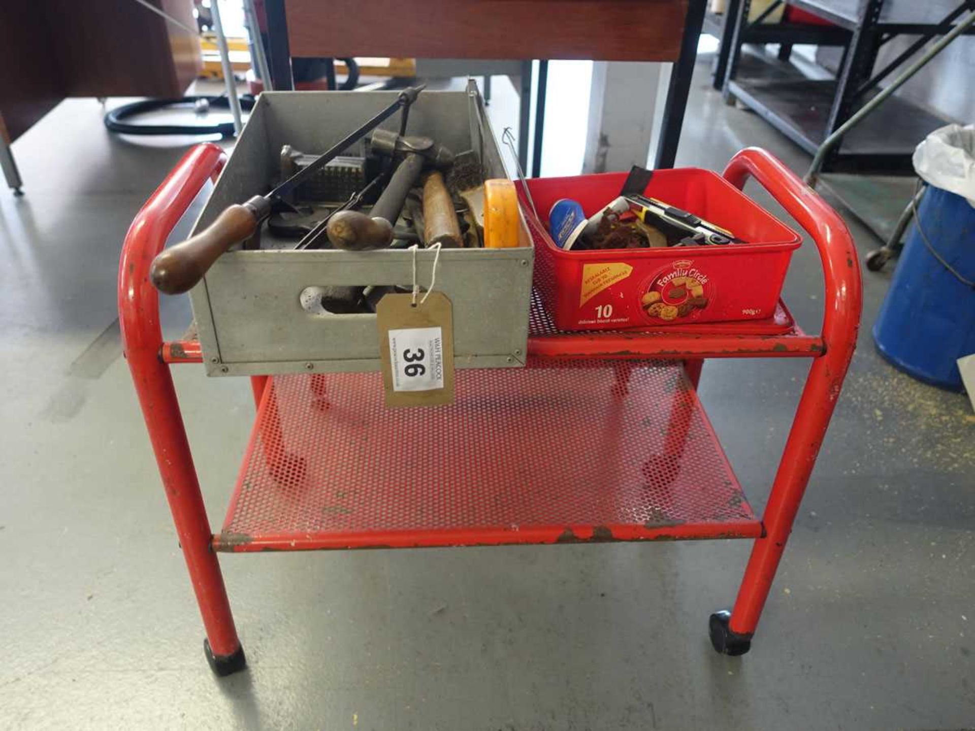 +VAT Red trolley with two tins of various hand tools