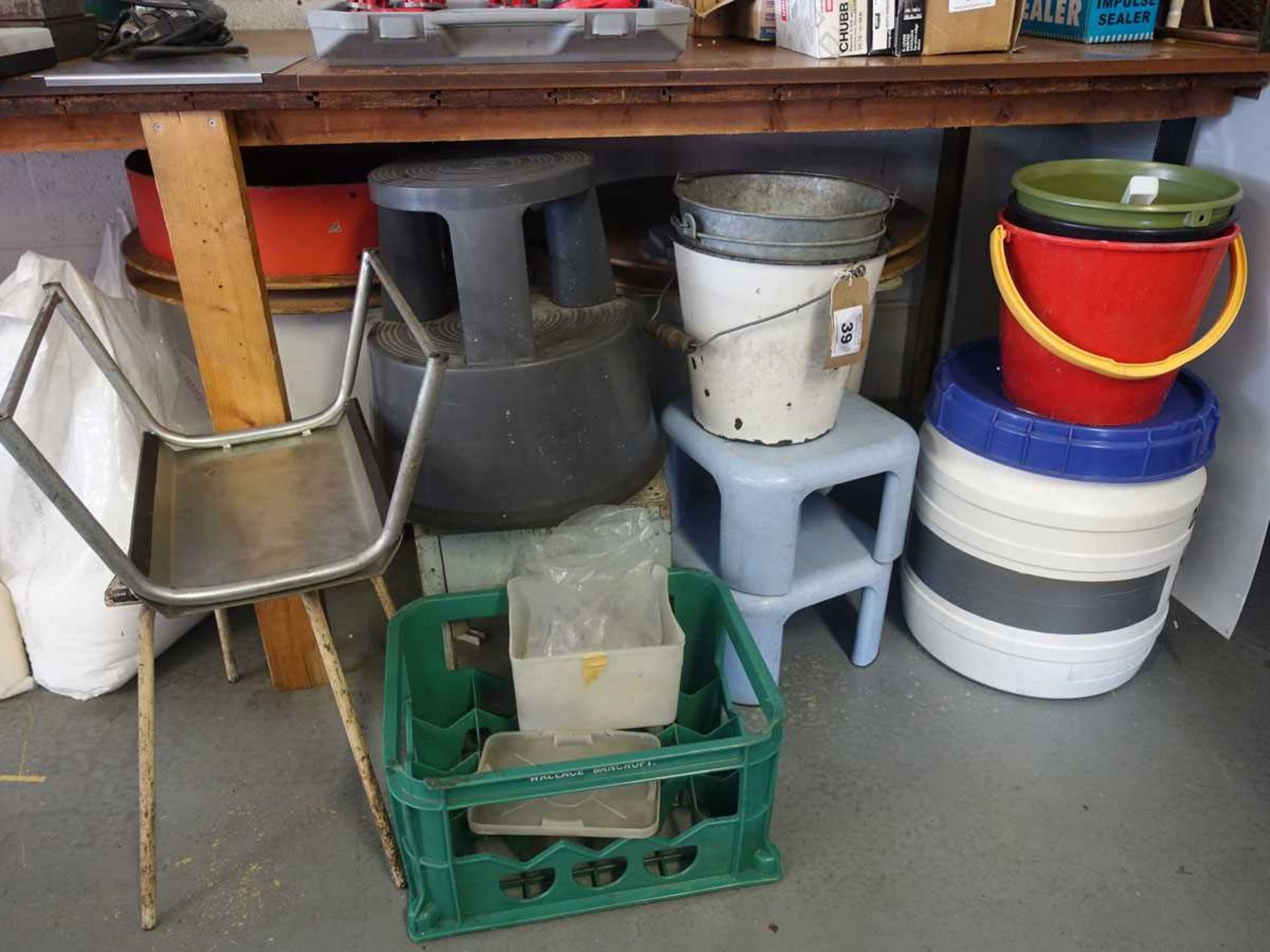 +VAT Under bay of various buckets, plastic trolley containers, stools, kick step etc.