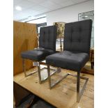 +VAT Modern pair of charcoal grey leather upholstered cantilever type dining chairs on metal frames