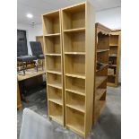 Slim modern pair of light oak finished open fronted bookcases