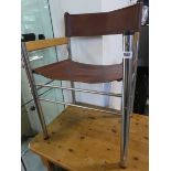 Mid Century Design / Bauhaus inspired Tubular Chrome and wooden framed chair with slung brown