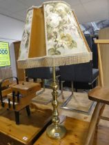Brass table lamp with large floral patterned shade