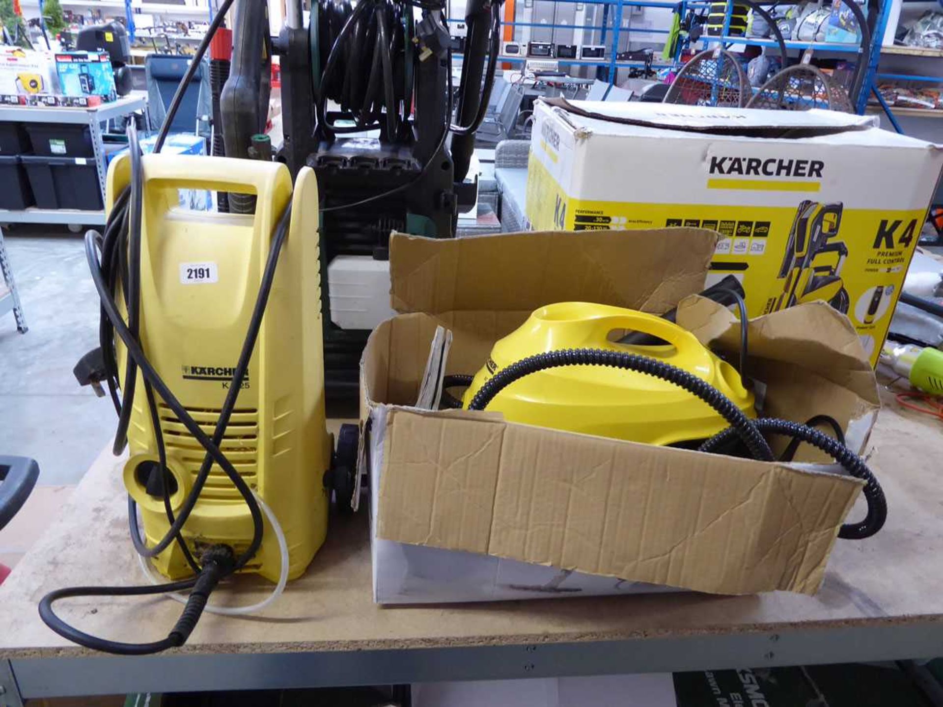 Karcher K2.25 electric pressure washer, together with a Karcher SC 3 pressure washer