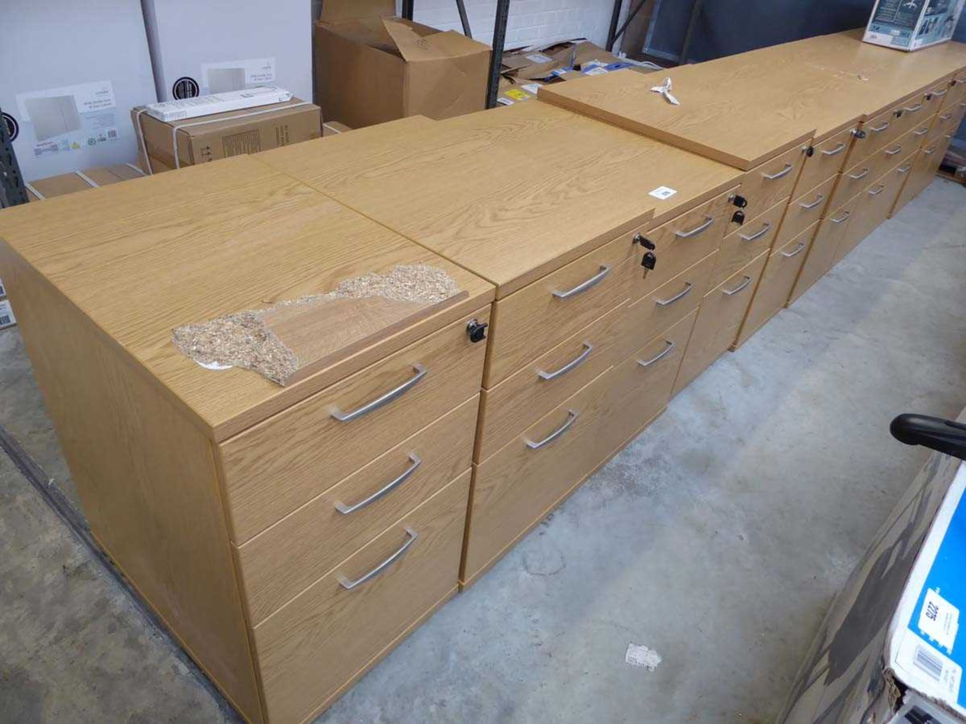 +VAT 10 light wood coloured 3 drawer pedestals