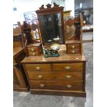 Mahogany dressing chest of 2 over 2 drawers with bevelled mirror and further drawers over