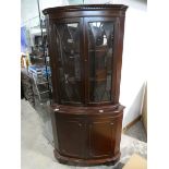 Mahogany effect corner display cabinet with curved frontage