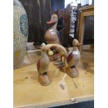 4 wooden duck ornaments