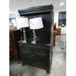 Black painted dresser with delicately patterned drawer fronts