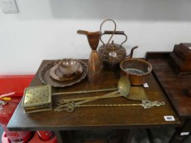 Collection of mixed copper and brassware, including brass chestnut roaster, other fire tools, copper