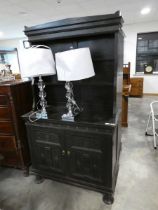 Black painted dresser with delicately patterned drawer fronts