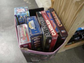 Pink box containing games and puzzles including Campaign, Curse of the Idol, Reminiscing, Brain Box,