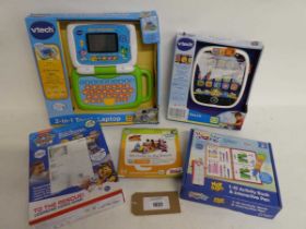 +VAT Selection of interactive learning games incl. Vtech 2 in 1 touch laptop, Vtech Touch & Teach