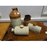 4 earthenware items including a wine jug, hot water bottles and 1 further brewers jar