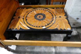 Black and bare wood floral patterened coffee table