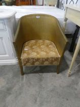 Gilt coloured Lloyd Loom armchair