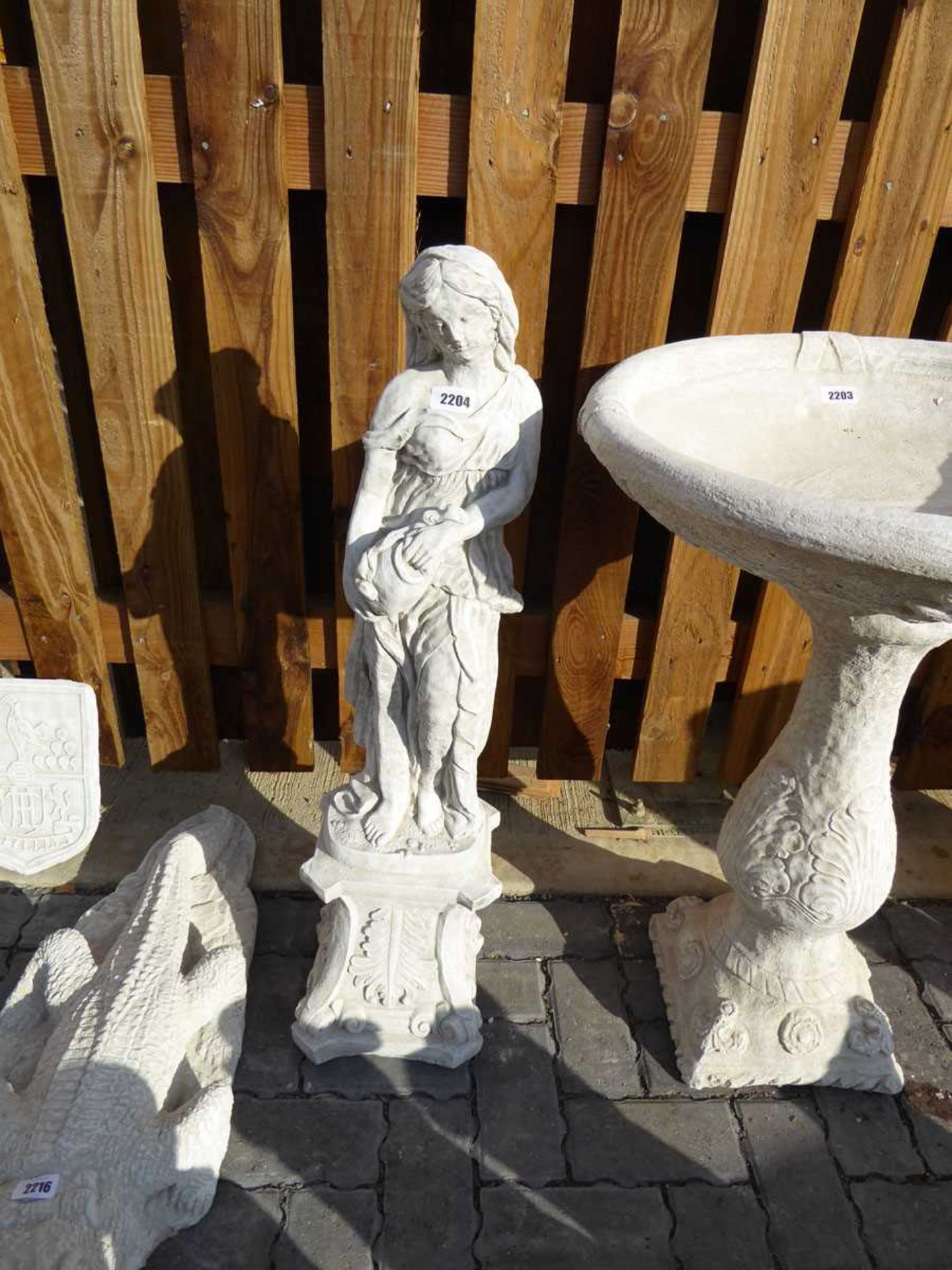 Concrete statue in the form of a water maiden